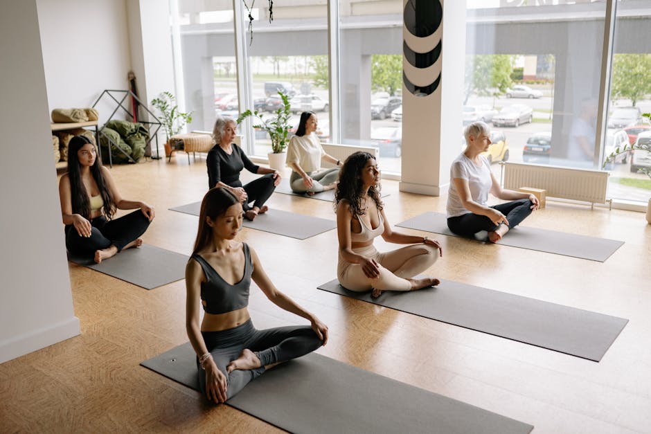 Diverse group of smiling people after a yoga class